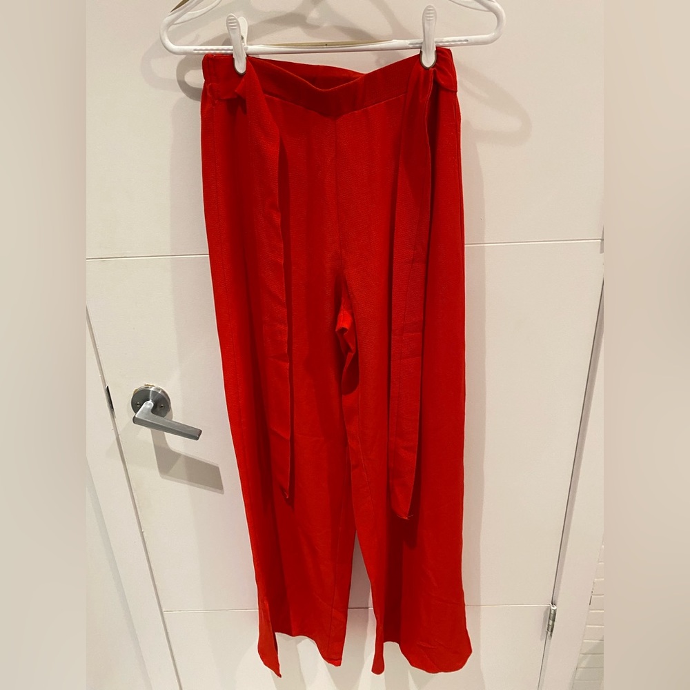 Small red flowy pants with bottom slit